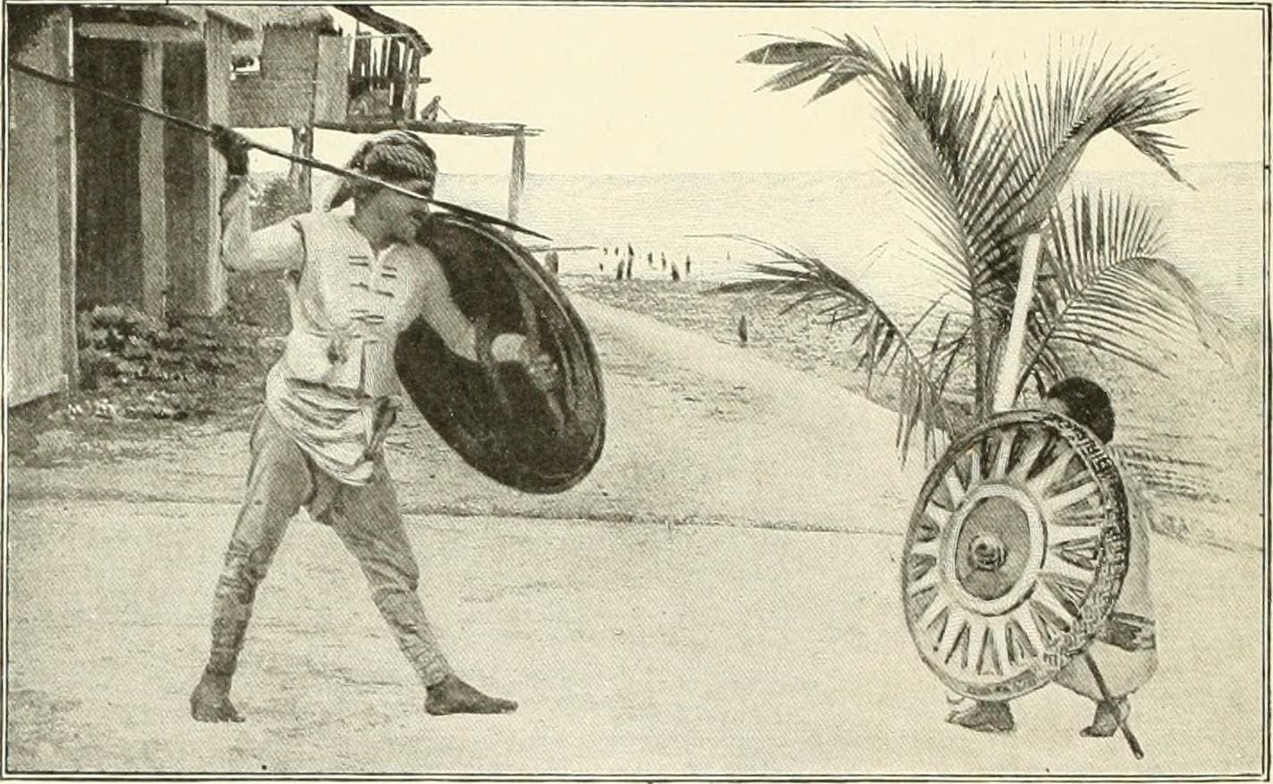 An 1899 engraving of a Tausug warrior in full regalia carrying a shield and blade.